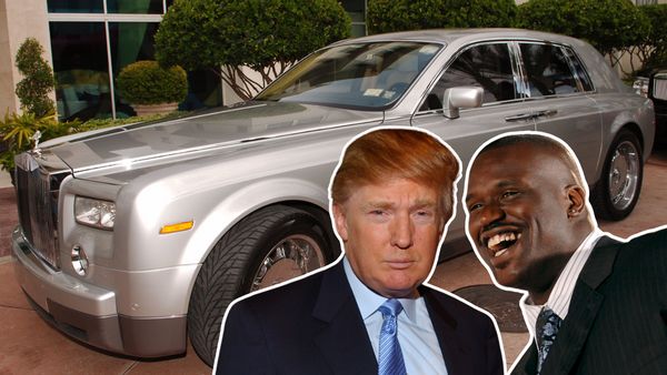 Photos of a white man and Black man wearing black suits are shown on top of a gray car.