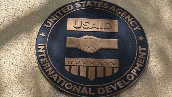 A sign says UNITED STATES AGENCY INTERNATIONAL DEVELOPMENT.