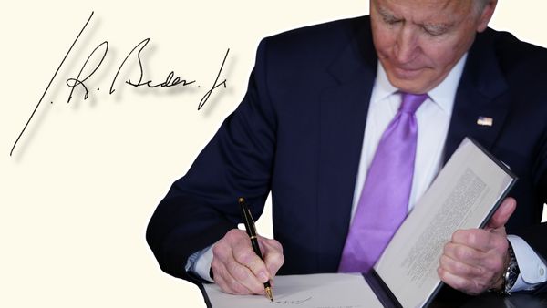 A cut-out image of former President Joe Biden, a white man with white hair in a suit, signing a bill with a cut-out image of his signature floating to the left of him. 