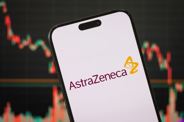 A white phone app says AstraZeneca in burgundy.