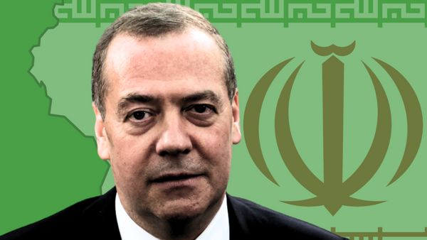 A white man is shown on an image of a symbol representing Iran.