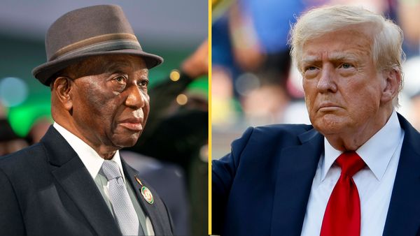 A Black man wearing a gray suit and hat is pictured next to a white man wearing a blue suit. A yellow line divides them.