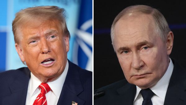 On the left: U.S. President Donald Trump, a white man with blonde hair and a dark tan. On the right: Russian President Vladmir Putin, a pale white man with grey hair.