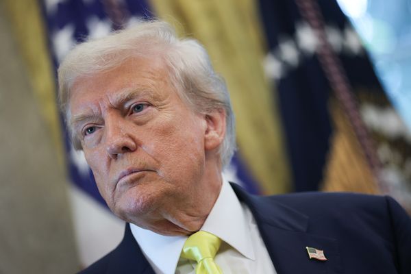 U.S. President Donald Trump, a white man with a tan and white-blonde short hair. 