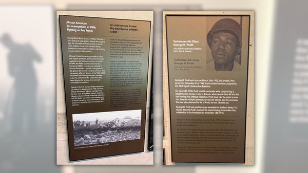 Two plaques state information about Black service members during WWII. The one on the left is more general, while the one on the right is specifically about George H. Pruitt. 