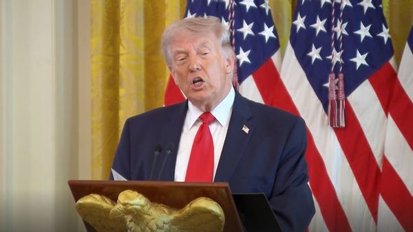 Image shows a screenshot from a deleted video of U.S. President Donald Trump speaking.