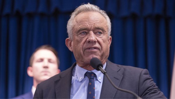 U.S. Secretary of Health and Human Services Robert F. Kennedy Jr. speaks into a microphone.