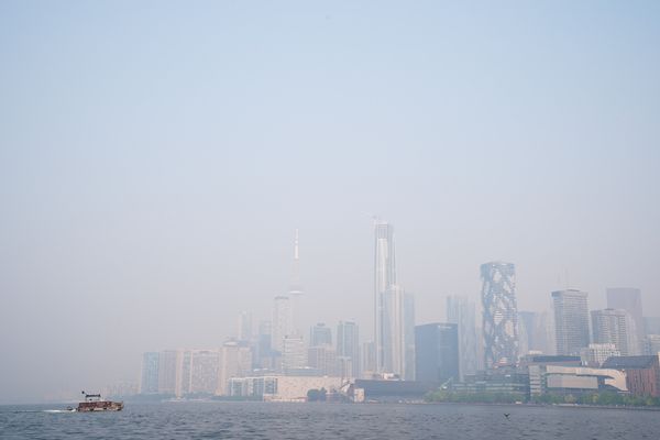 A hazy, smoke-filled city of Toronto skyline. 